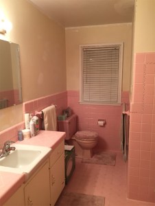 The pink bathroom: wallpaper stripped