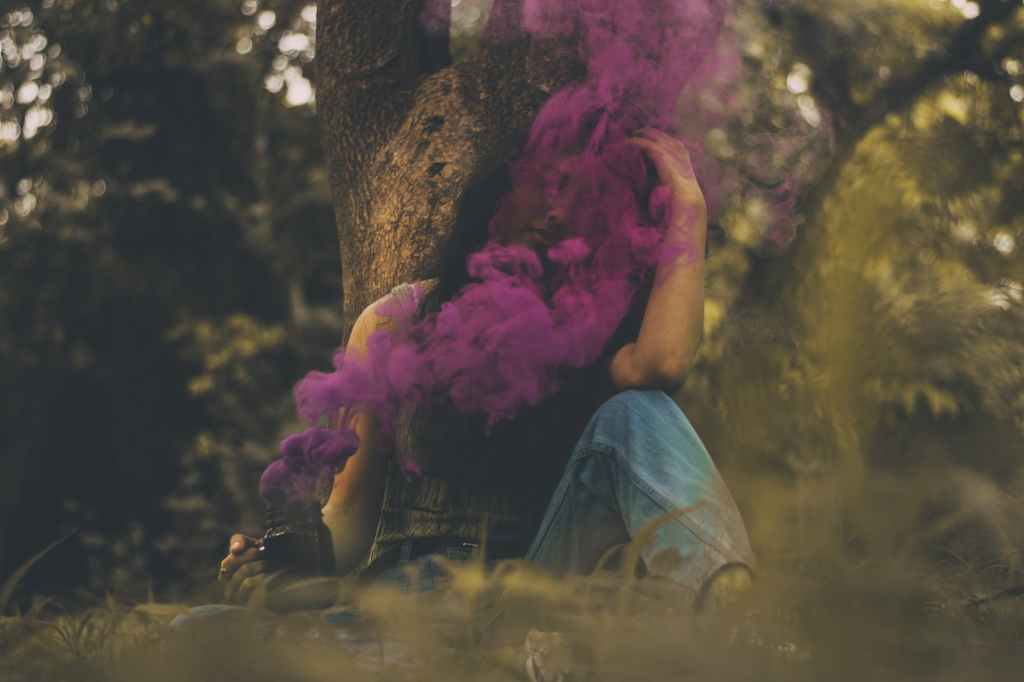 woman in purple smoke