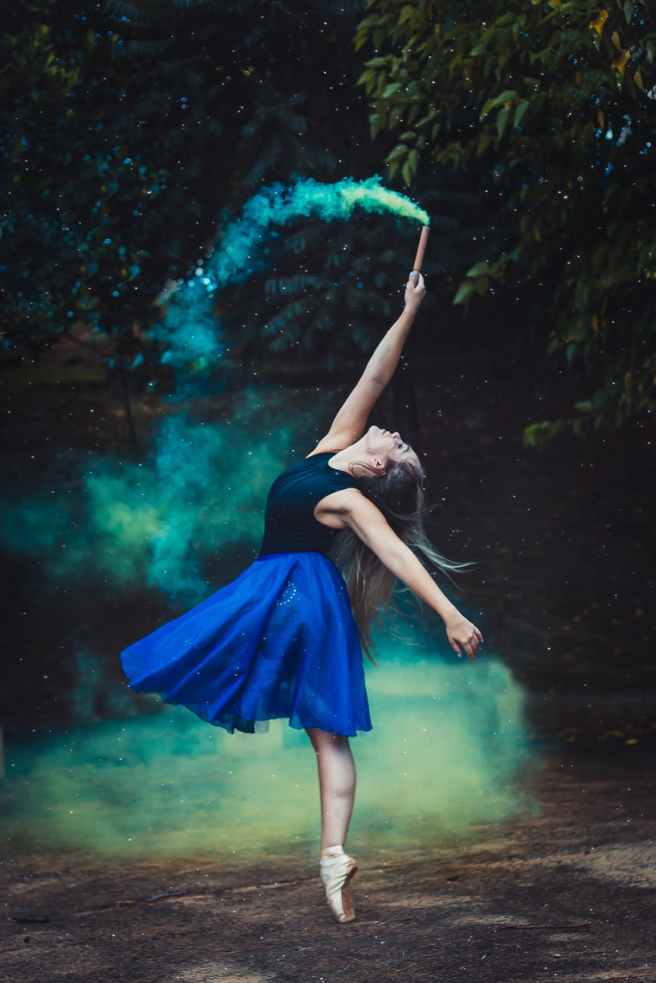 A ballerina in blue and green