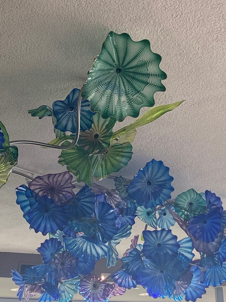 green and blue glass ceiling sculpture